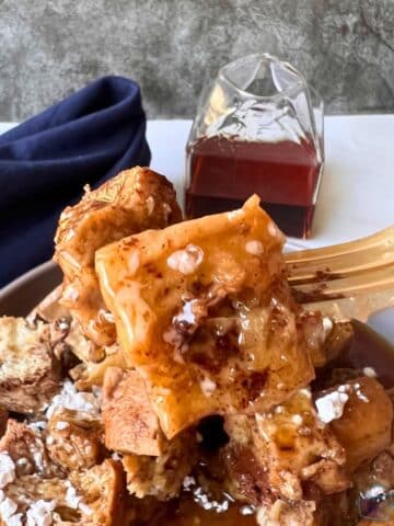 A close up of slow cooker French toast casserole on a fork