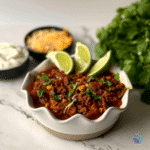 side view of a bowl of slow cooker chili - no beasn