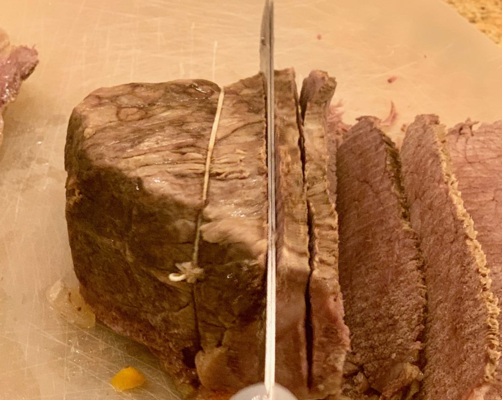 easy roast  being sliced with an electric knife