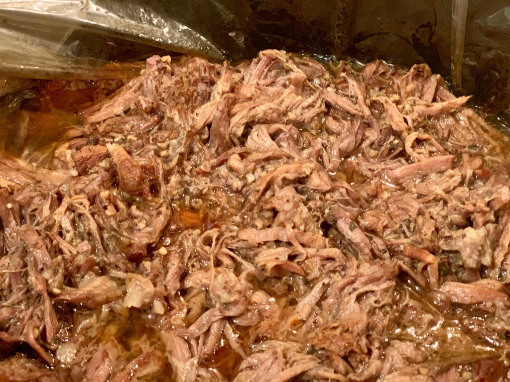 Shredded lazy beef barbacoa in the pot