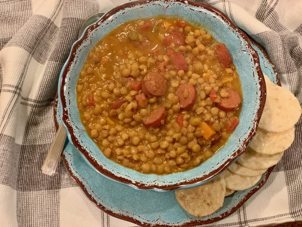 Lazy Lentil Hot dog soup ready to be served with crackers