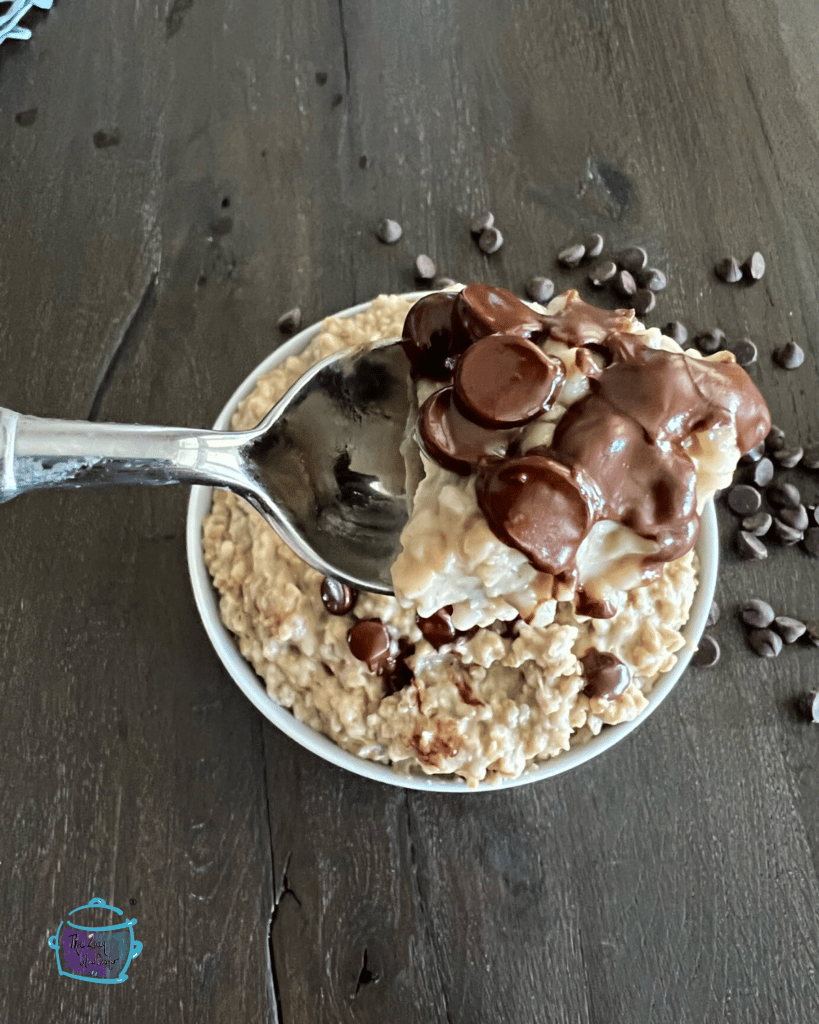 close up of Chocolate Chip Cookie Dough Overnight Oats made in a crockpot on a spoon