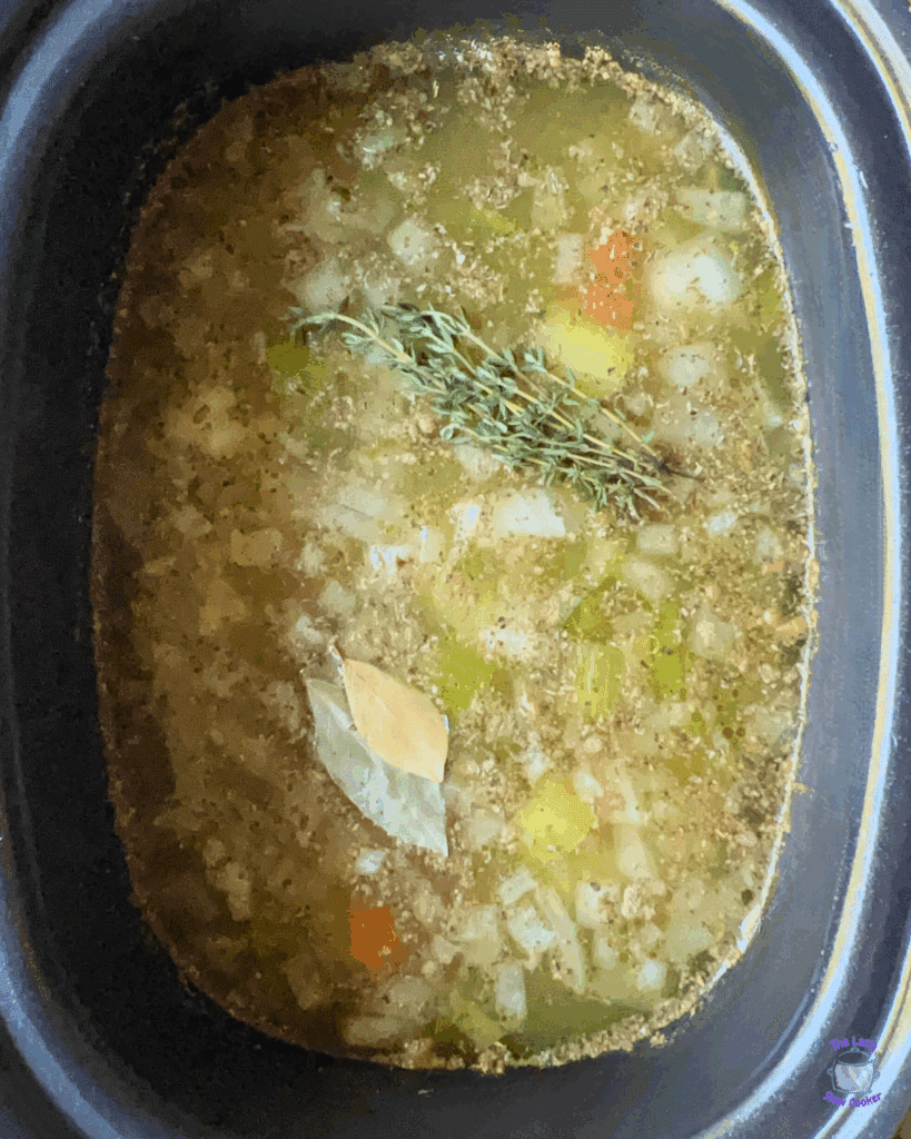 all pea soup ingredients in a slow cooker before cooking