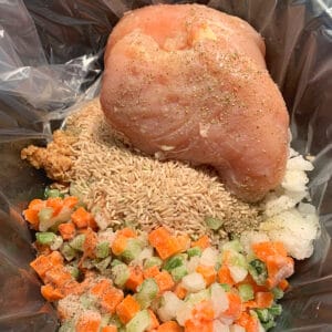 Chicken, rice and frozen diced veggies in a crockpot