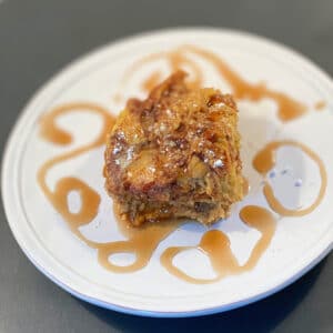 Close up of finished product on a plate with syrup swirls