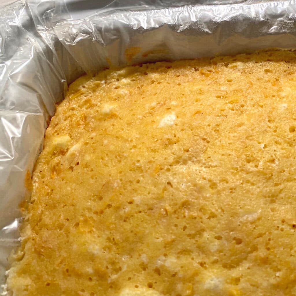 cooked corn spoonbread in slow cooker prior to serving