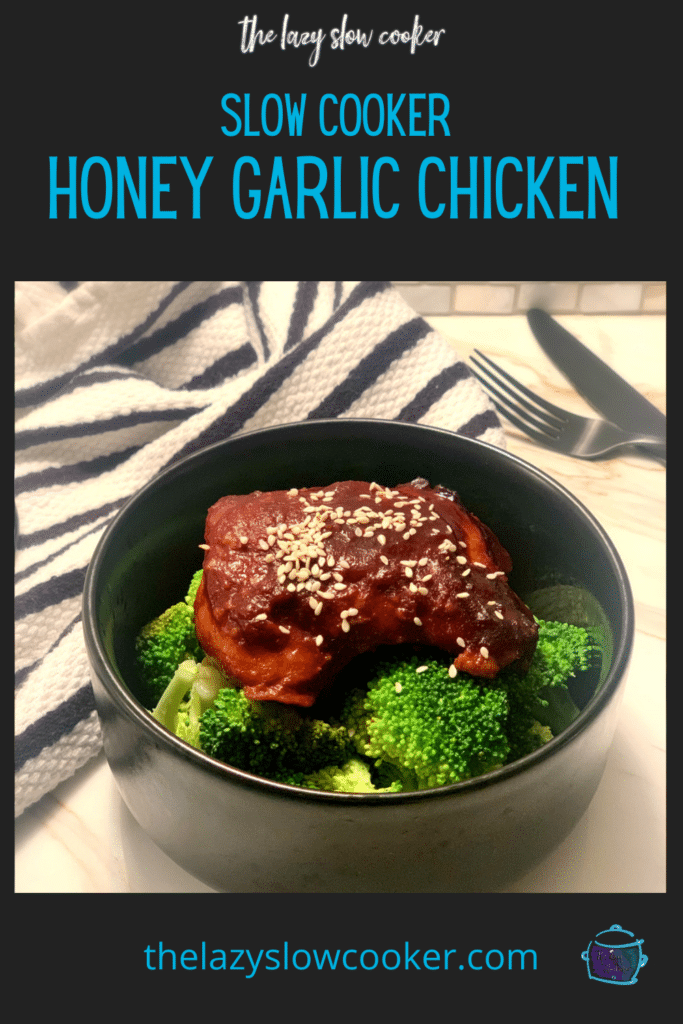 slow cooker honey garlic chicken topped with sesame seeds on a bed of broccoli
