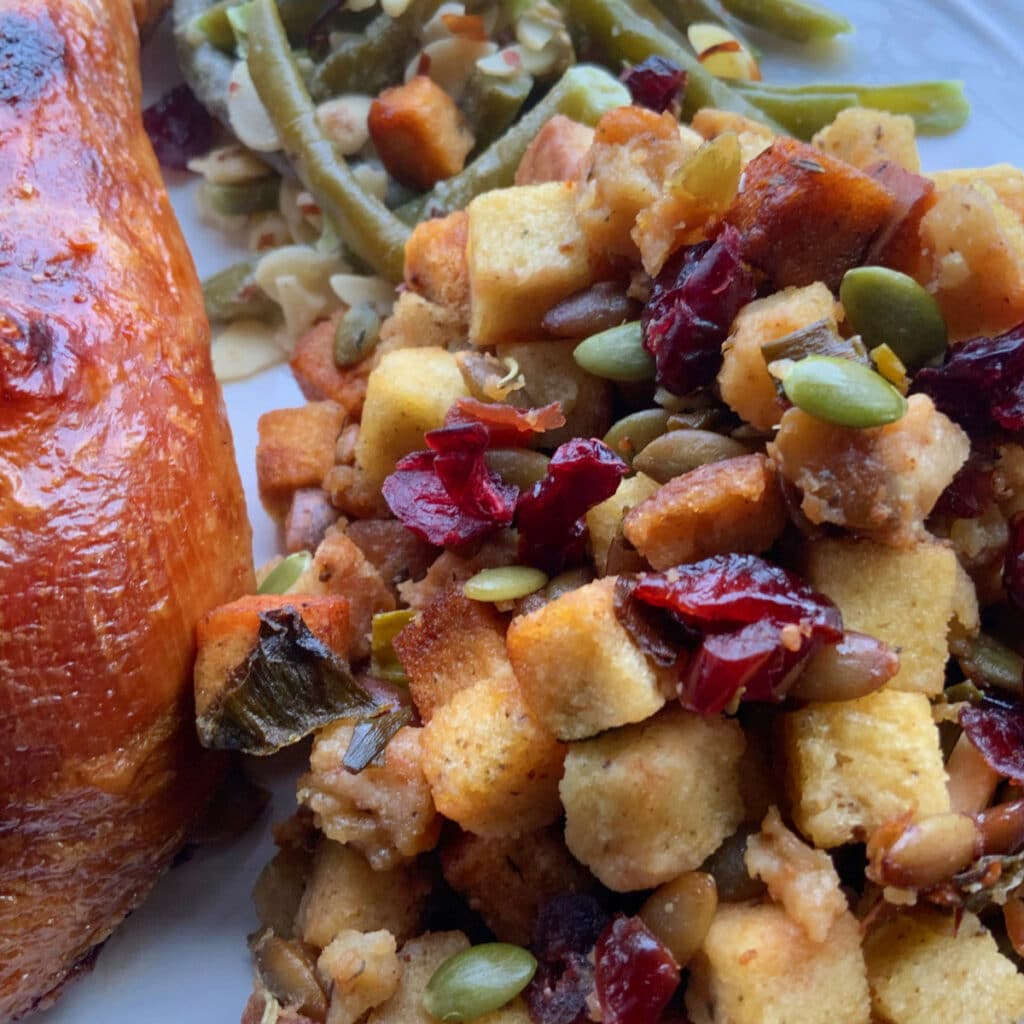 Cranberry stuffing on a plate with turkey and string beams