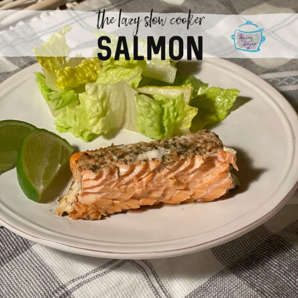 skinny slow cooker recipe  featuring with a piece of cooked salmon, lettuce and lime wedges