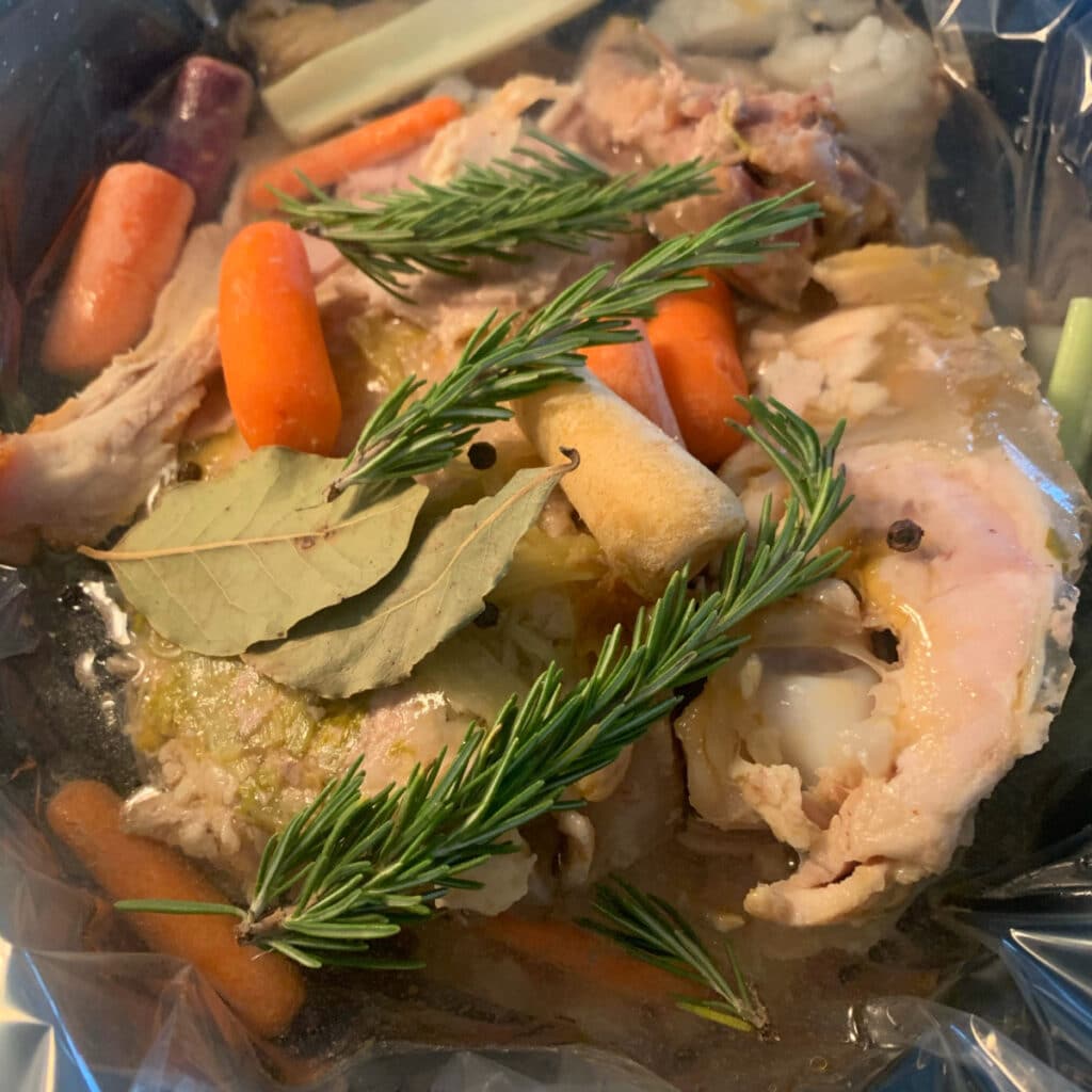 All turkey soup ingredients in slow cooker prior to cooking and before adding broth