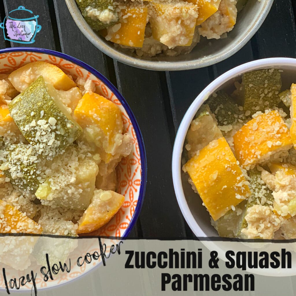 Squash and zucchini chunks lightly coated in grated parmesan cheese in 3 round bowls on a black table