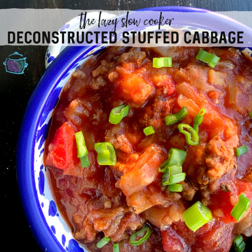 A blue rimmed bowl of slow cooked unstuffed cabbage