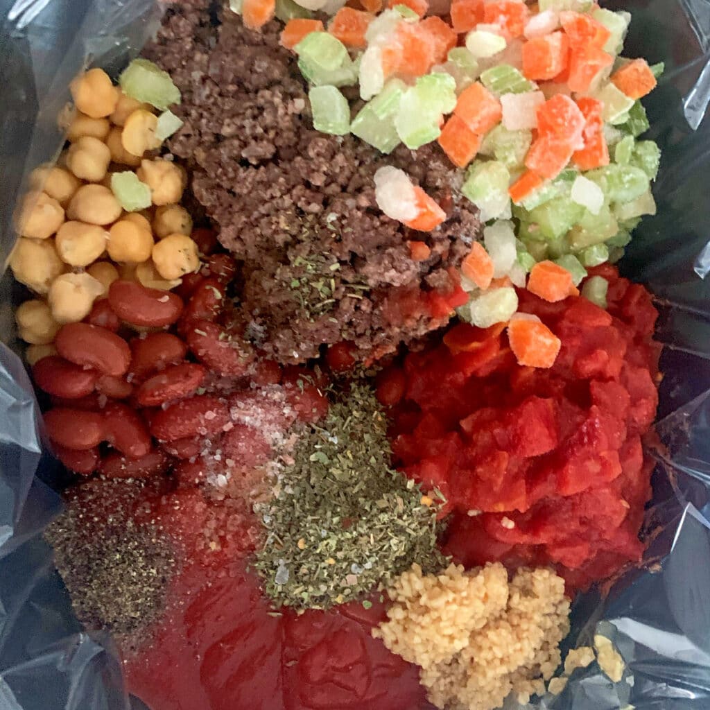 Raw ingredients in slow cooker prior to mixing