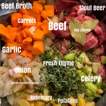 Raw ingredients for beef and beer stew in crockpot with labels prior to liquid being added