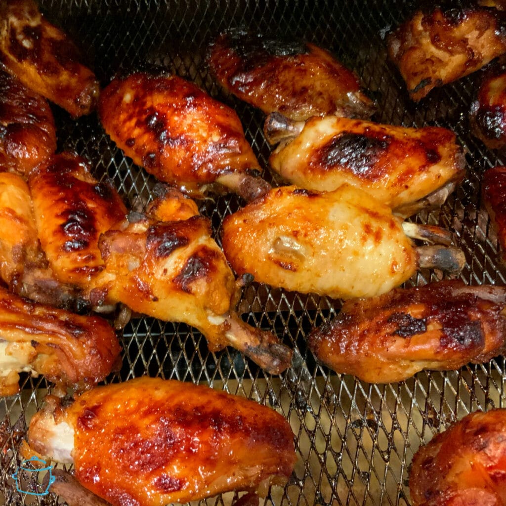 looking down on a plate of crispy on an air fryer tray