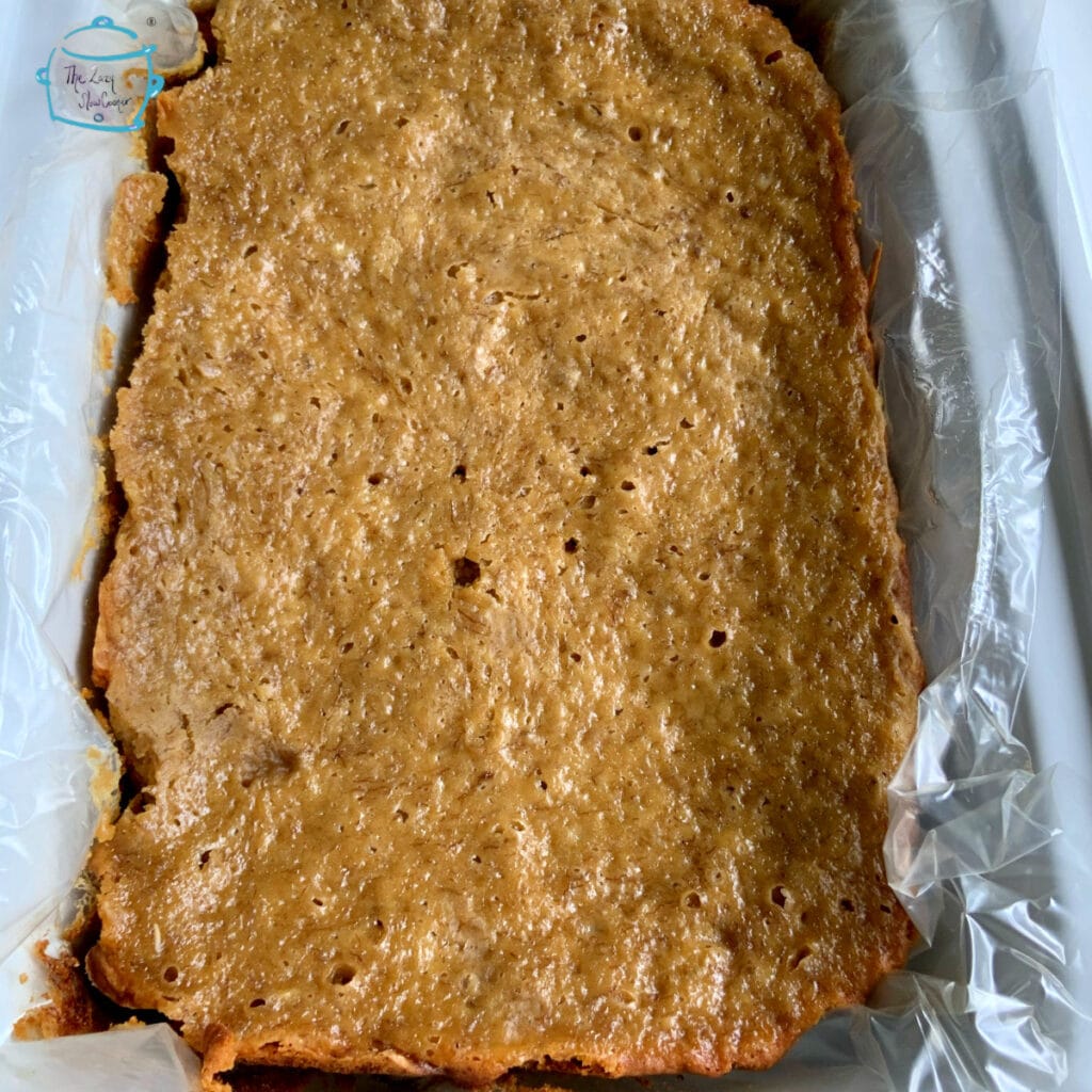 A full loaf of peanut butter banana bread cooking in slow cooker