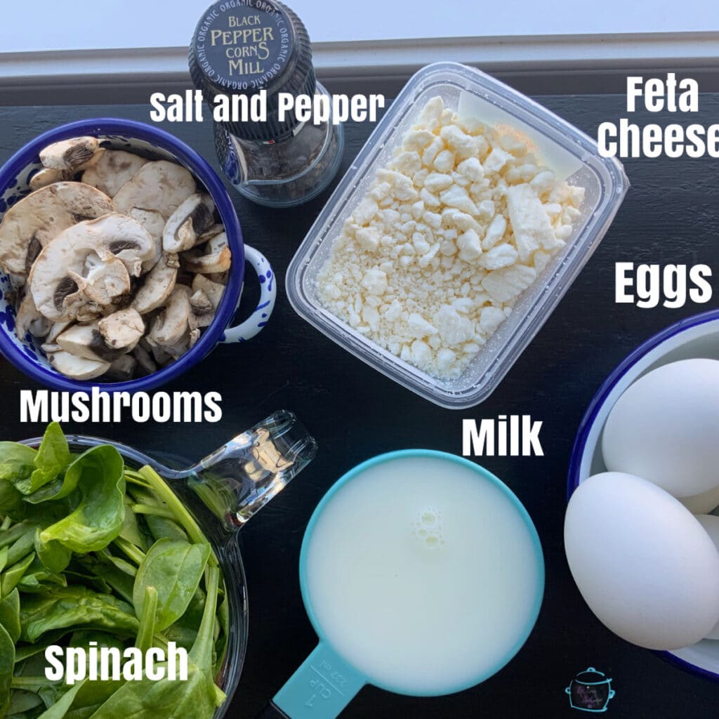 All frittata ingredients laying on a table with labels