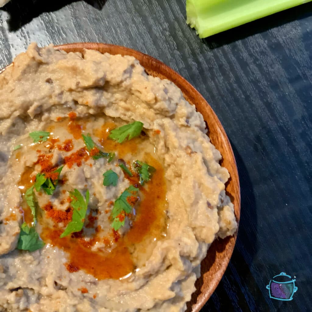 Baba ganoush sprinkled with olive oil, smoked paprika and chopped parsley