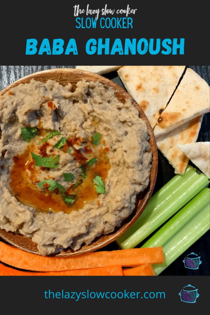 a bowl full of baba ghanoush surrounded by carrots, celery and pita for dipping