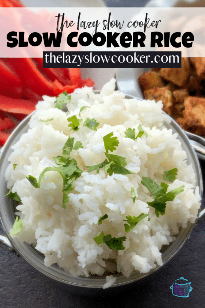 A bowl of white, fluffy crockpot rice with diced parsley on top