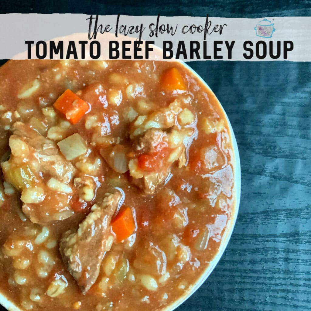 a bowl of thick, rich looking tomato beef barley soup