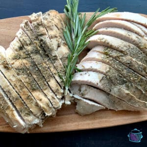 Finished sliced turkey breast on serving board