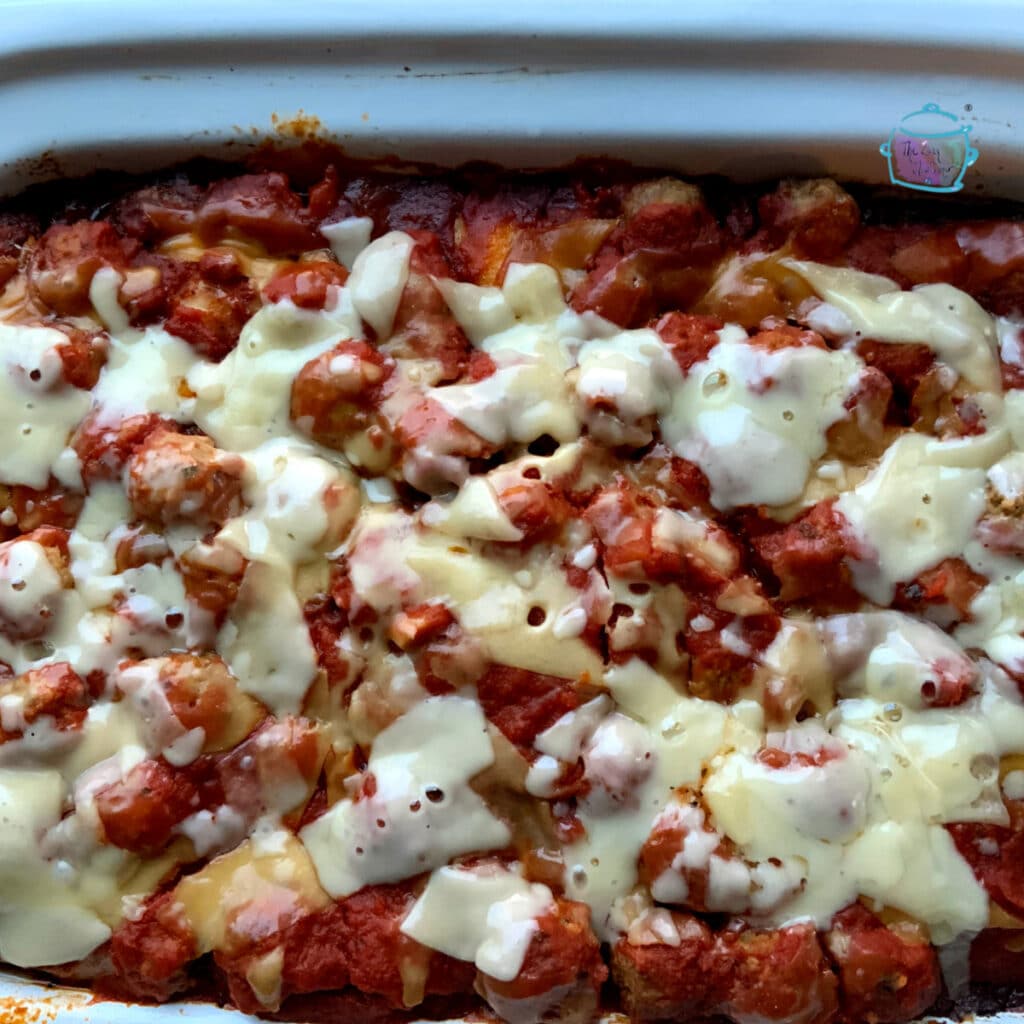 Finished meatball and ravioli dish in slow cooker