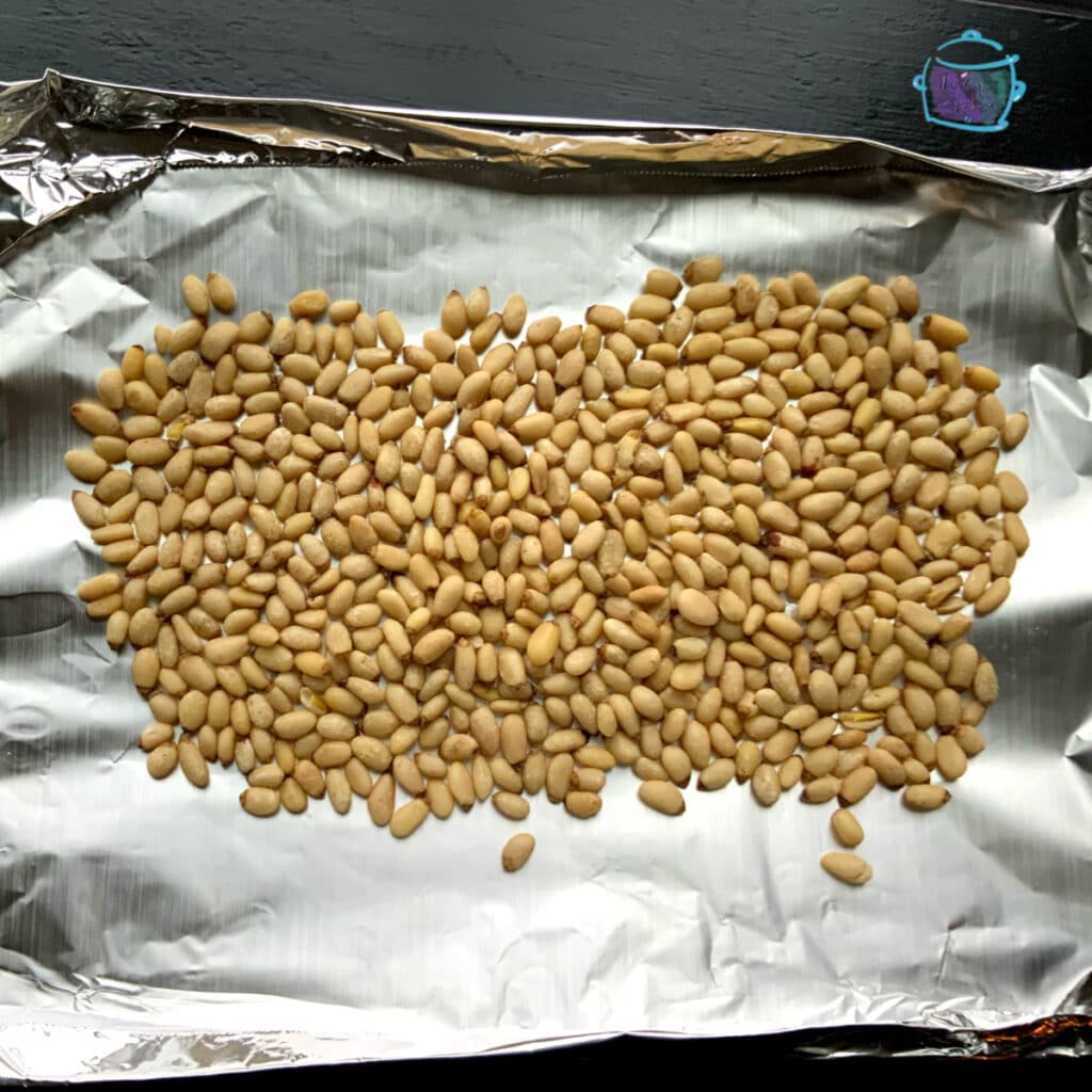 pine nuts on a foil sheet