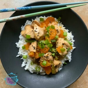 Finished dish on a plate with chopsticks