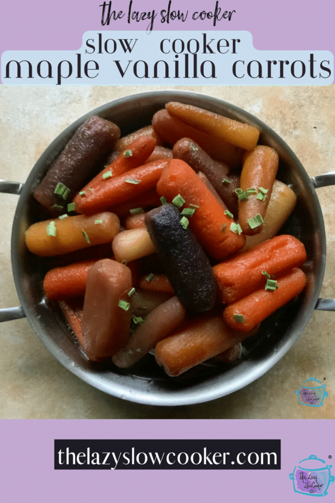 a pot full of colorful carrots with seasonings on top
