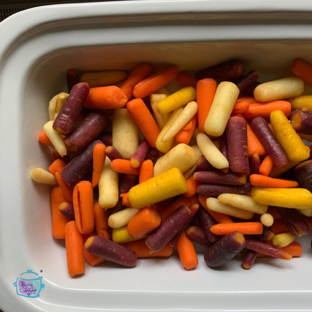 rainbow carrots in slow cooker before cooking