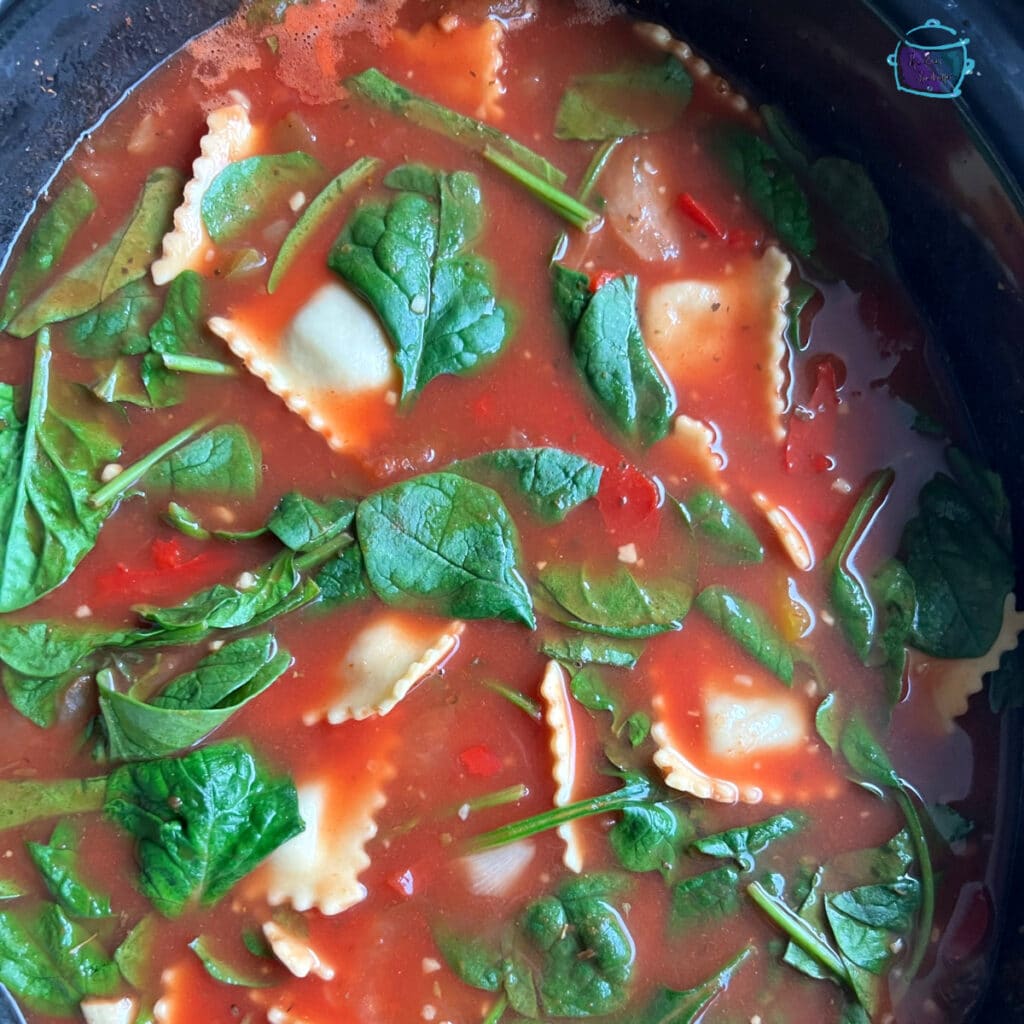 Soup in crockpot once spinach and ravioli have been added