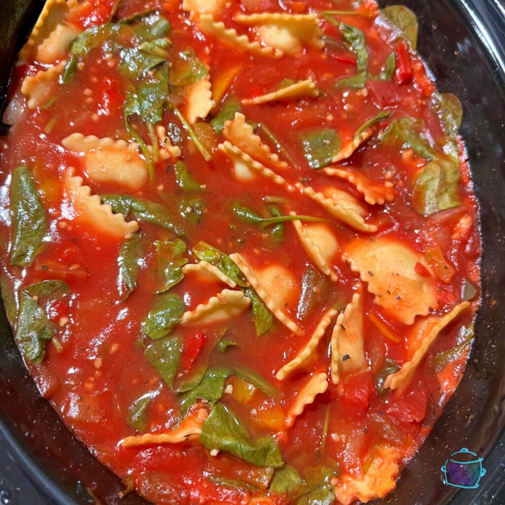 Finished crockpot ravioli soup ready to plate