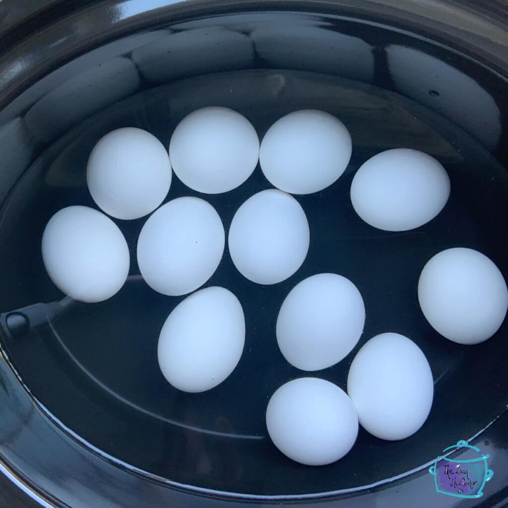a crockpot filled with eggs