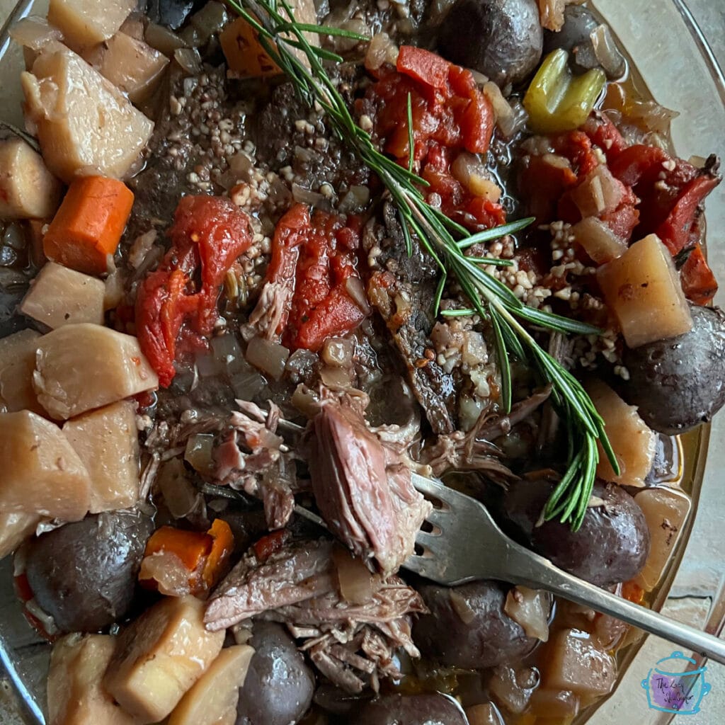 close up of yankee roast in a dish with some beef on a fork