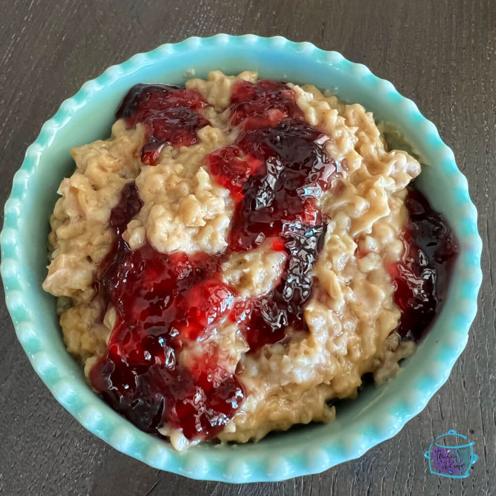 looking down on a finished bowl of peanut butter an jelly oatmeal