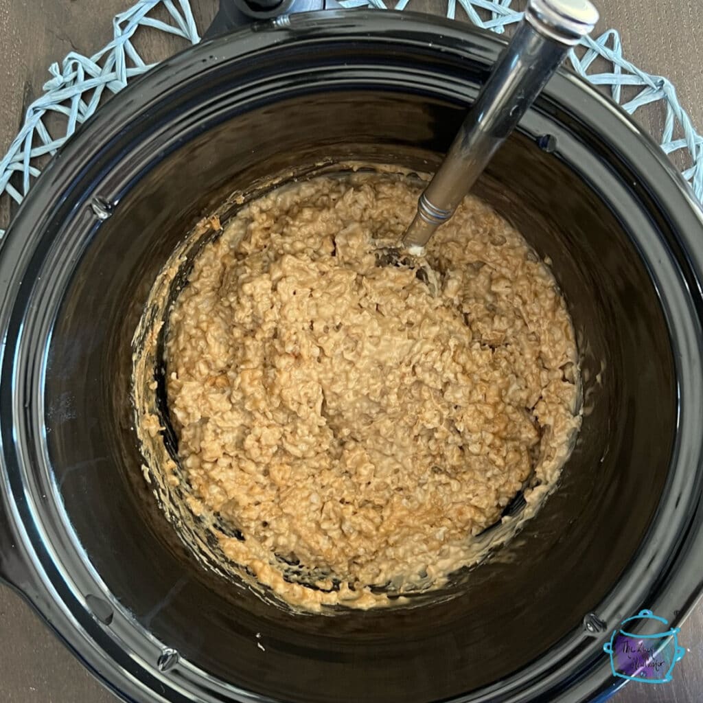stirring finished oatmeal in crockpot