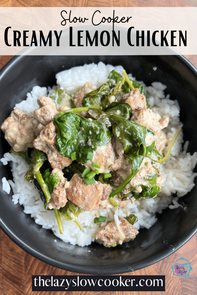 a black bowl filled with rice and slow cooker creamy chicken with spinach