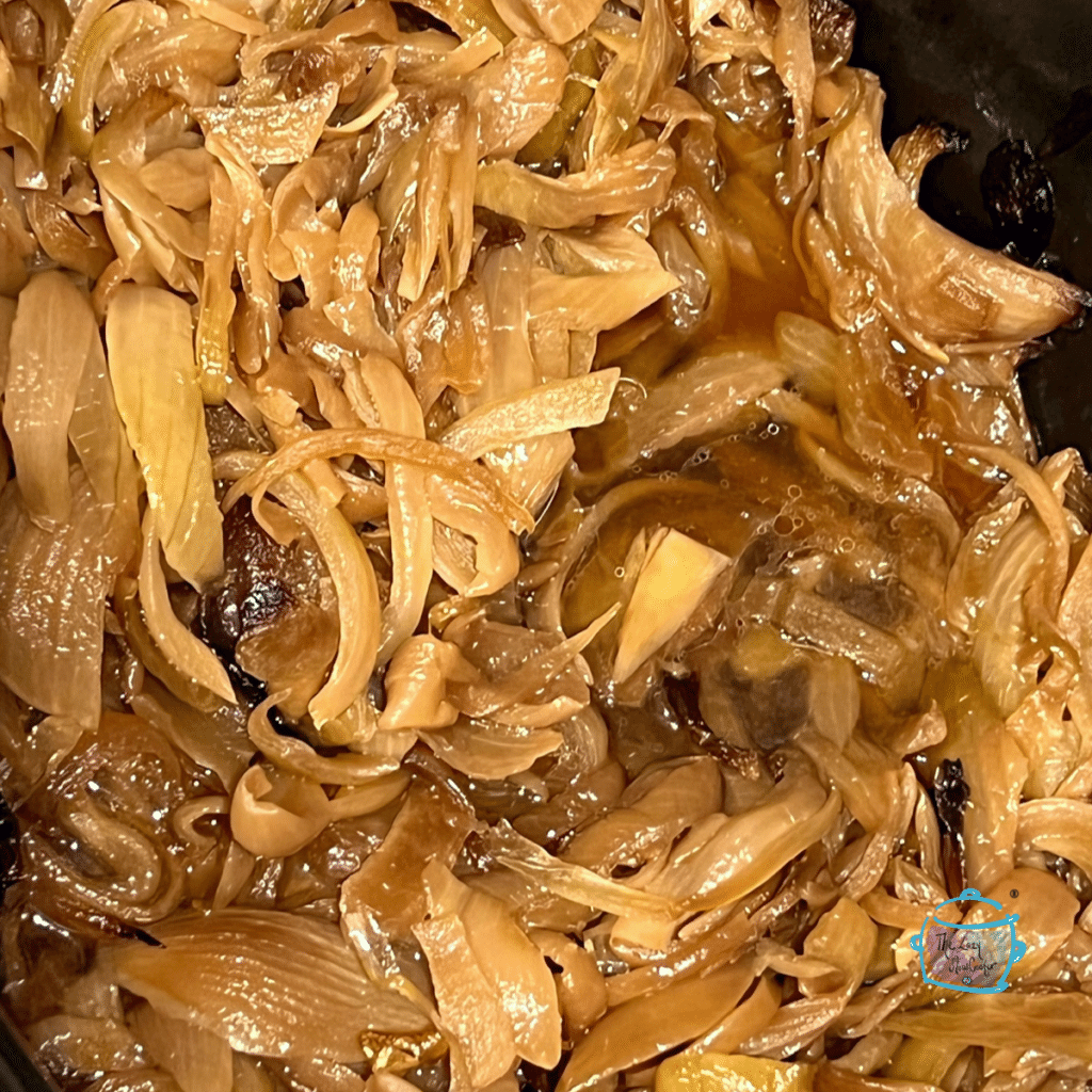 Caramelized onions in slow cooker with onion juice before evaporation