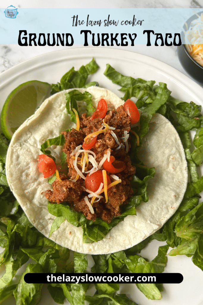 Pinterest pin of an open soft tortilla laying on a bed of lettuce topped with ground turkey taco meat