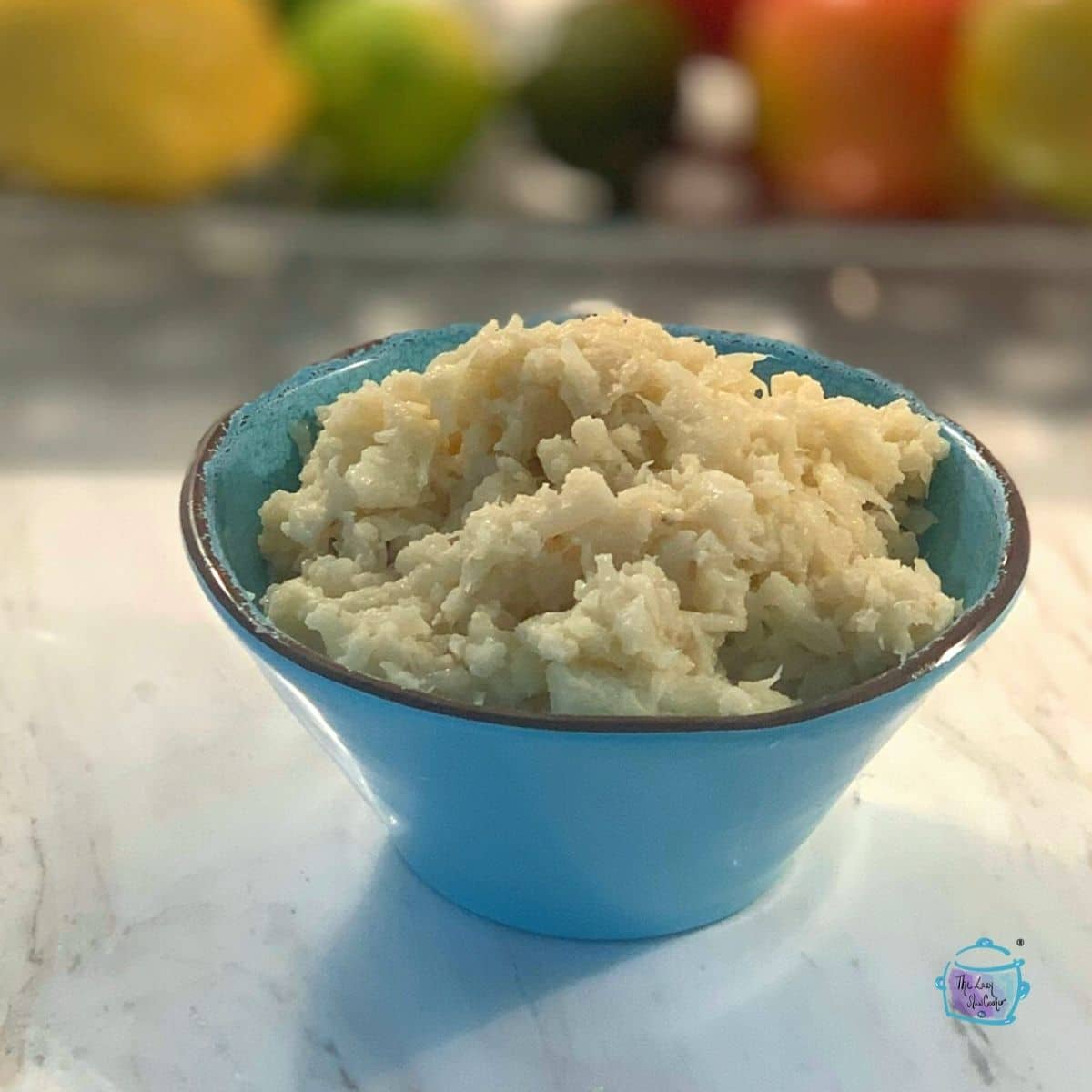 A blue bowl of mash cauliflower