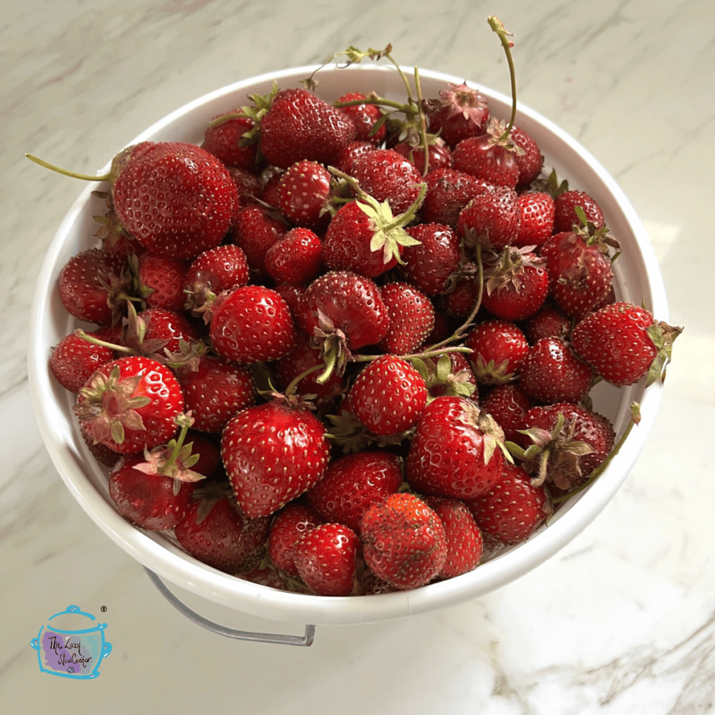 a bowl of freshly picked strawberries