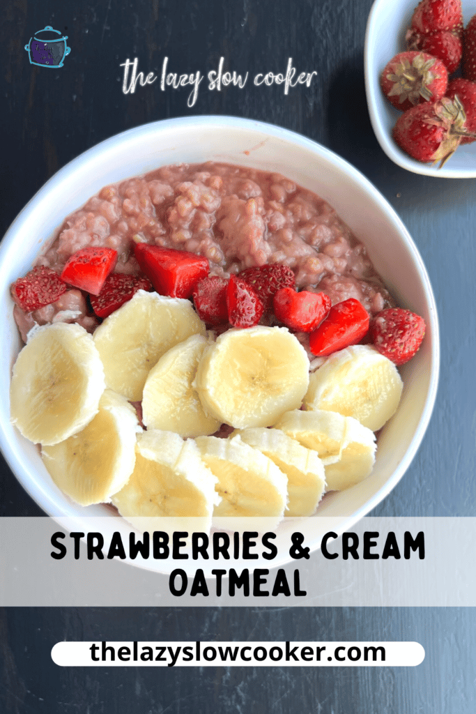 looking down on a bowl of oatmeal topped with fresh strawberries and bananas