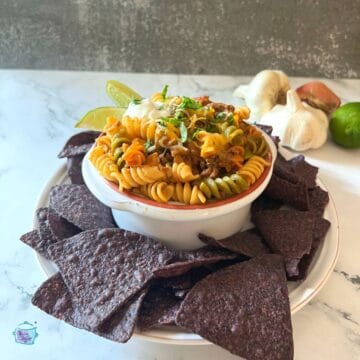 slow cooker taco and pasta dish in a bowl