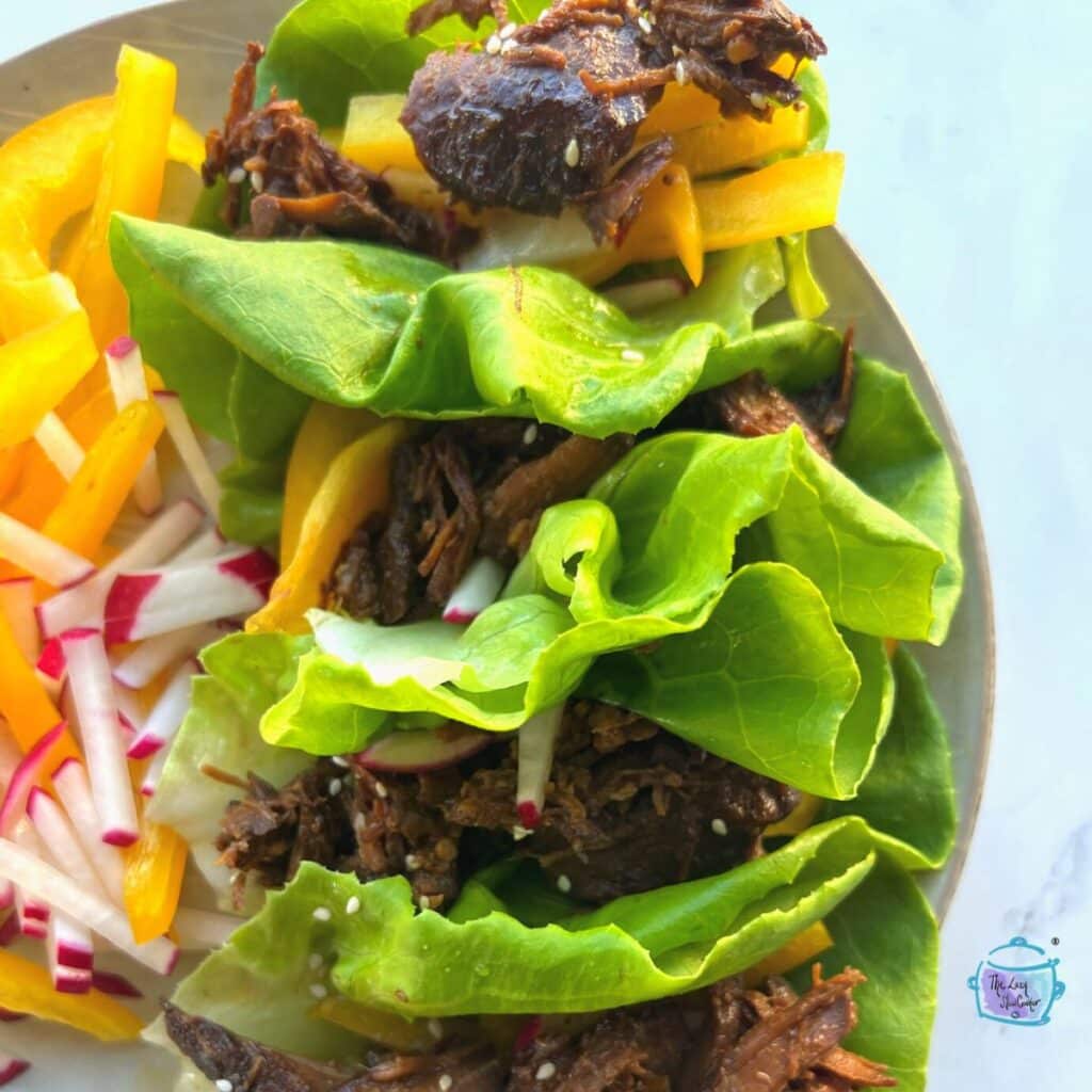 slow cooker beef lettuce cups on a plate