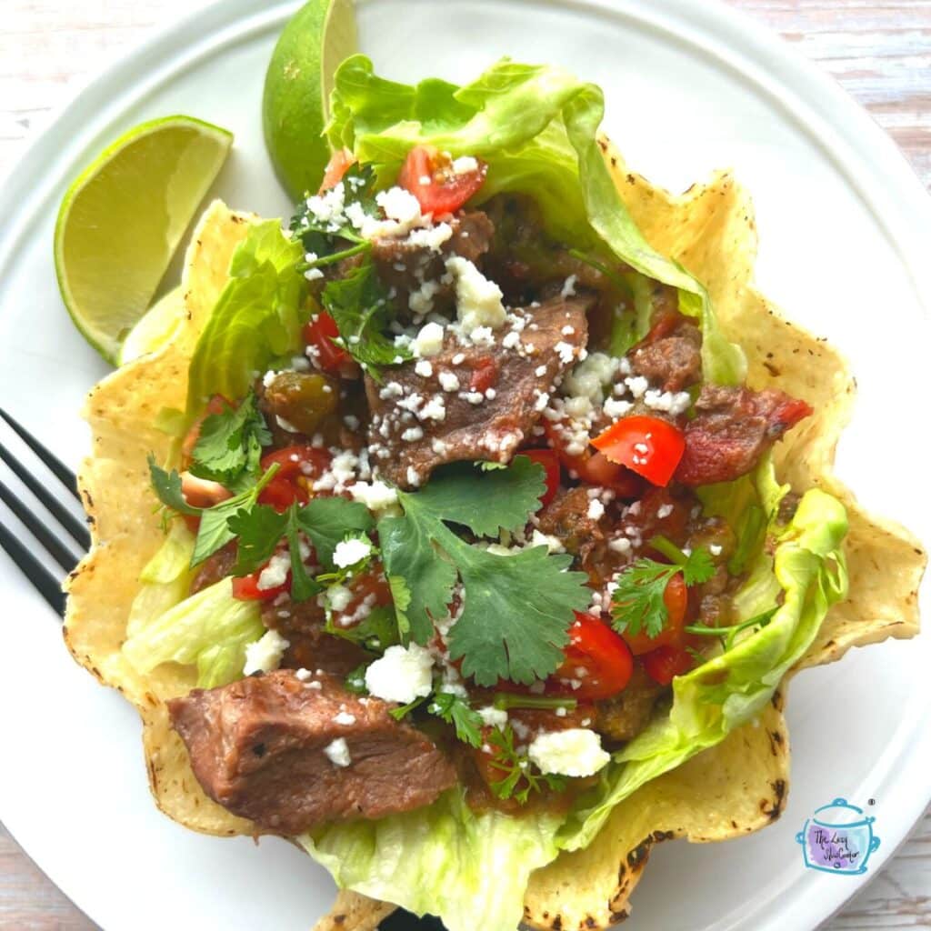 crockpot carne picada in a taco bowl