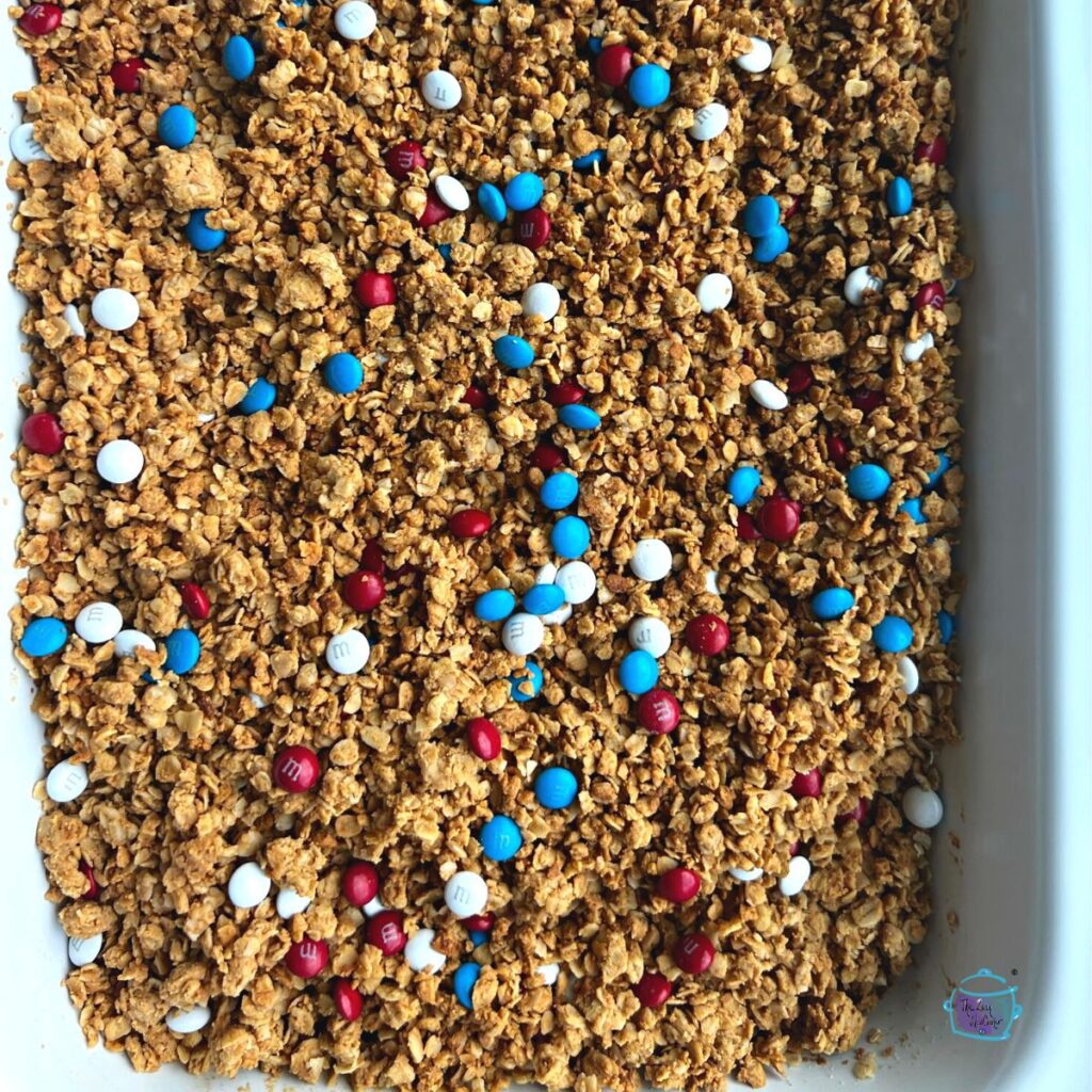 slow cooker peanut butter granola with M&m's in crockpot