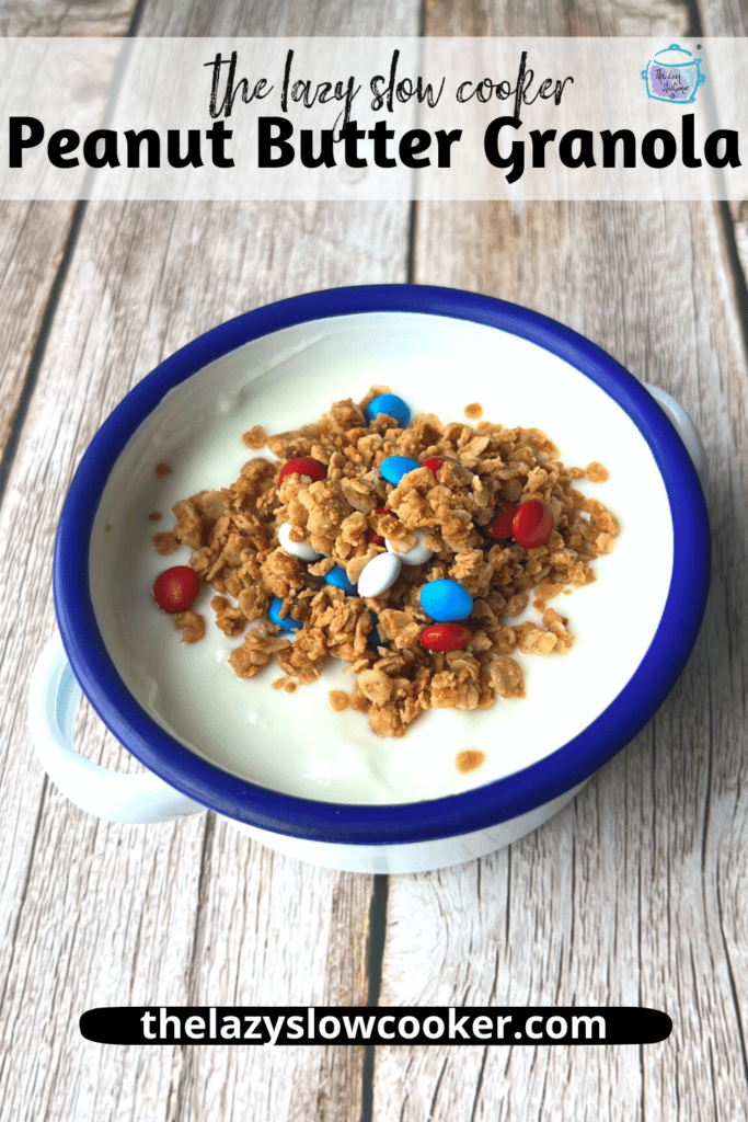 slow cooker peanut butter granola with M&m's on top of yogurt