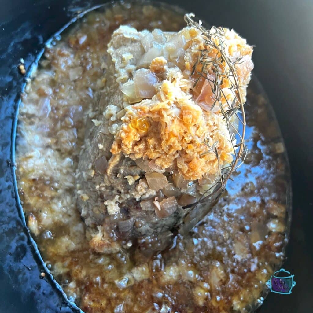 finishred horseradish eye of round roast in slow cooker