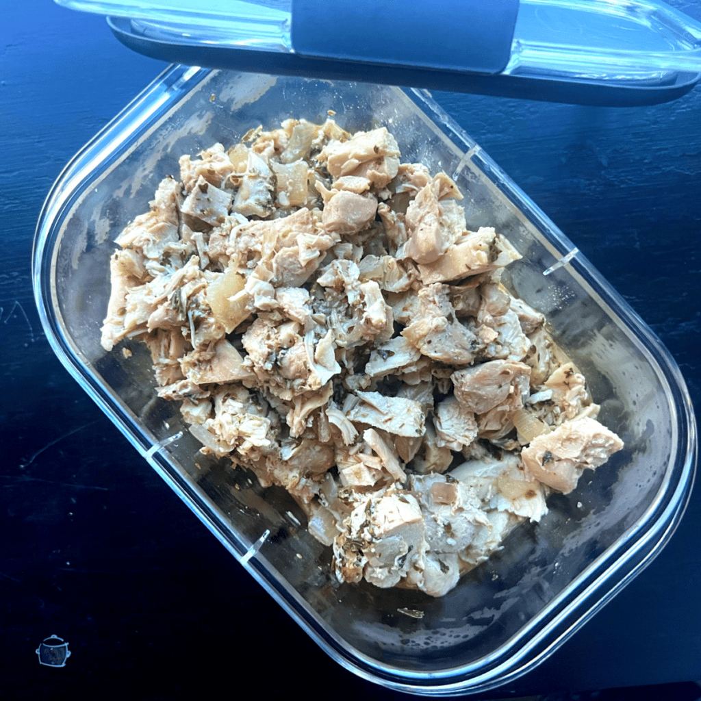 leftover gyro chicken in a storage container